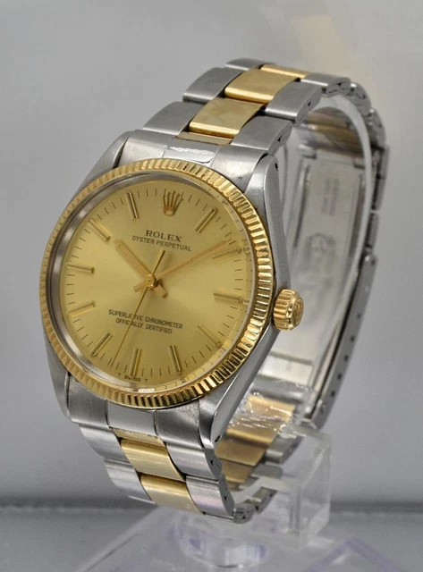 Rolex Oyster Perpetual 1005 Champagne Dail 34mm 14k Gold & Stainless Steel Watch