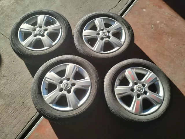 N.4 CERCHI LEGA - OPEL - 5 FORI 15" 6Jx15H2 ET49 - 185 65 R15 92H M+S