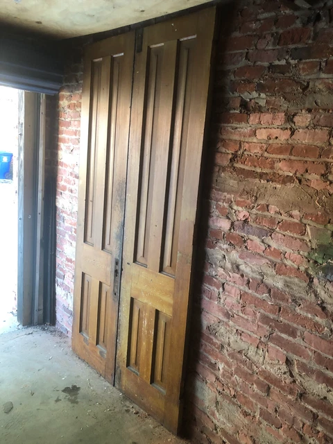 Pair of 24x94” Exterior 4-Panel Doors from Antique General Store / narrow panels
