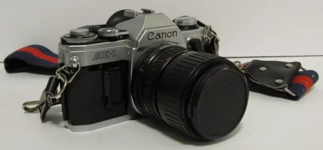 Cámara fotográfica Canon AE-1 SLR con lente zoom y accesorios 35-70 mm f1: 3,5-4,5 FD