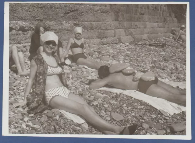 Girls in swimsuits and guy in trunks under rocks Soviet Vintage Photo USSR