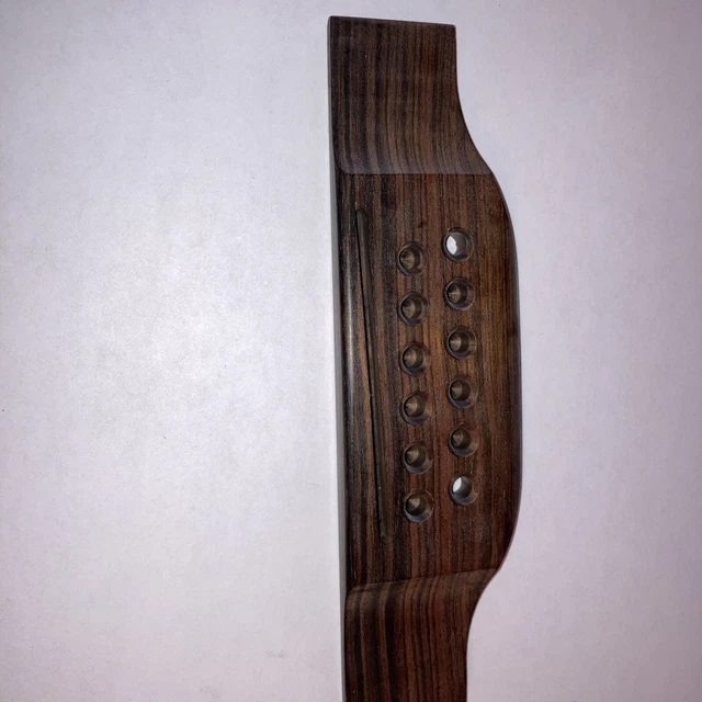 NOS 1980’s Gibson 12 string acoustic guitar rosewood bridge from kalamazoo NOS 1980’s Gibson 12 string acoustic guitar rosewood bridge from kalamazoo
