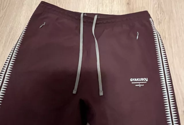 Pantalón encubierto x gyakusou Nike Storm-fit Giza estampado pista talla S marrón 3