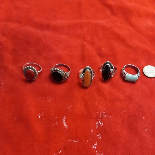 5 LOT VINTAGE STERLING SILVER ASSORTED W STONES WOMEN RINGS. sold as is.