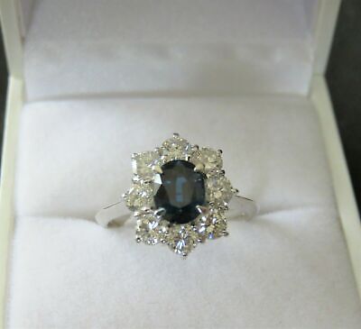 2.65 Tcw Blue Untreated Sapphire & Large Diamonds Halo Platinum Ring