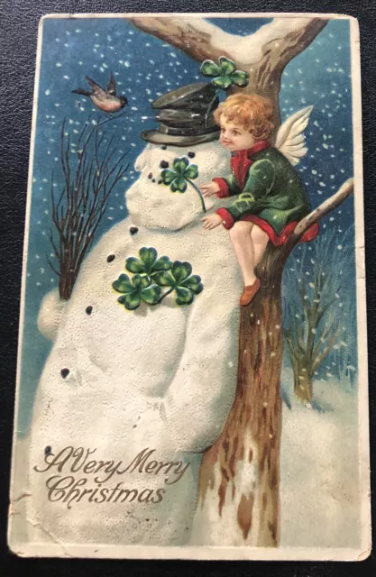 Cherub Giving 4 Leaf Clovers To Large Snowman Christmas Vintage Postcard DD68