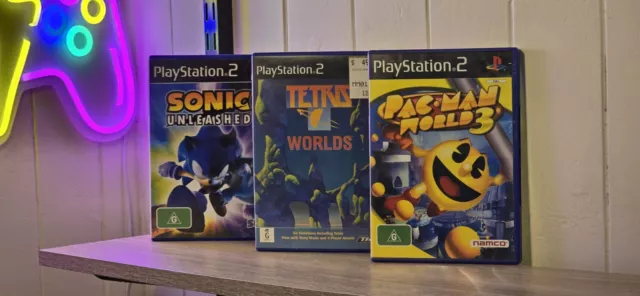 Playstation 2 Games X3- Pac-Man World 3, Sonic Unleashed, Terri's Worlds.