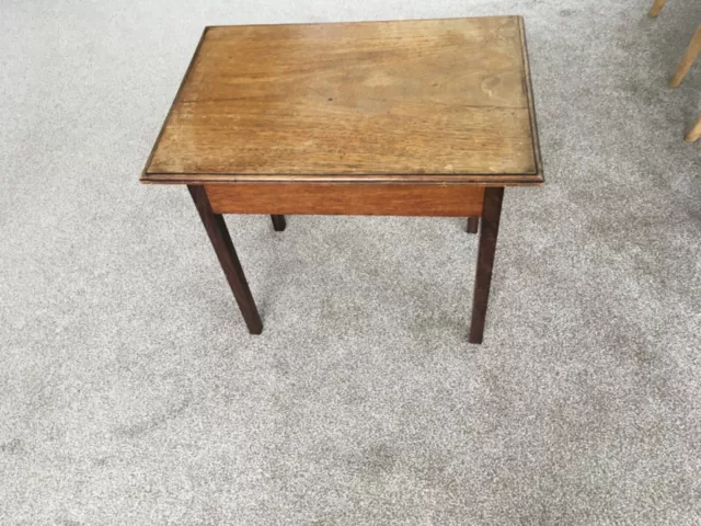 old small side table real wood age unknown. Some sun bleaching