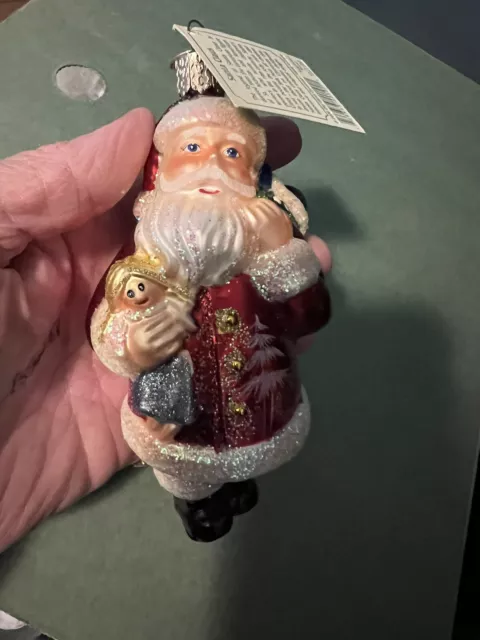 Old World Christmas SANTA CLAUS HOLDING DOLL Ornament