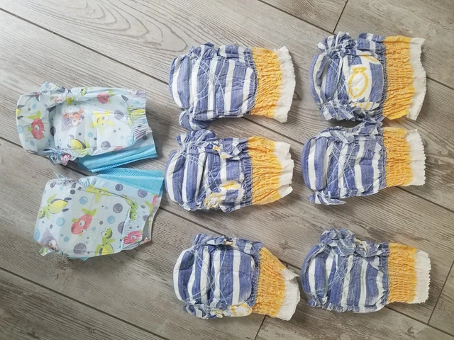 Lot de 78 couches changes bébé taille 4+   9-20kg  neuf 4