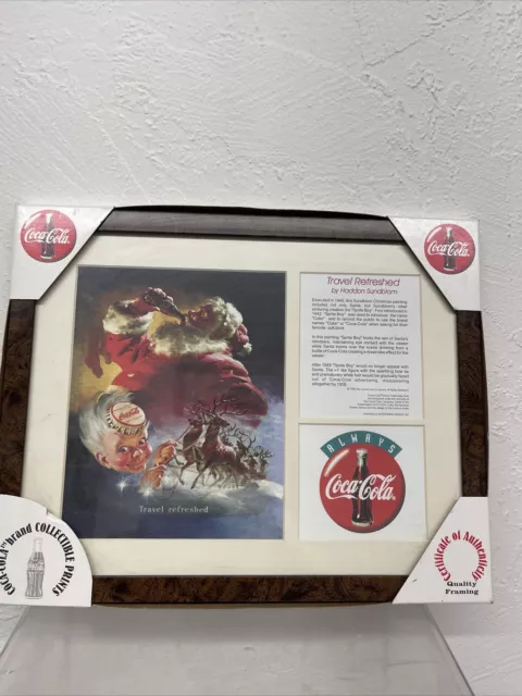 1998 Coca Cola Haddon Sundblom Travel Refreshed Santa & Sprite Boy Framed Print