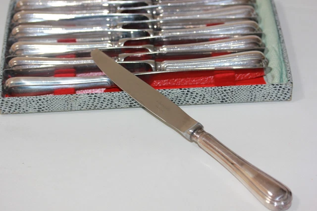 Série de 24 couverts de table en métal argenté - Modèle Spatours