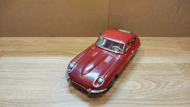 Vintage retro car litho tin toys Japan. Jaguar E type Rally car tin friction 60s