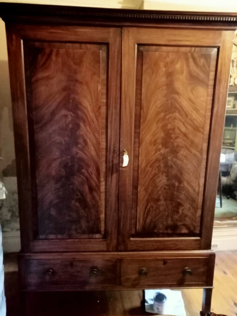Antique former linen press. now wardrobe 2 over 2 chest of drawers on wheels