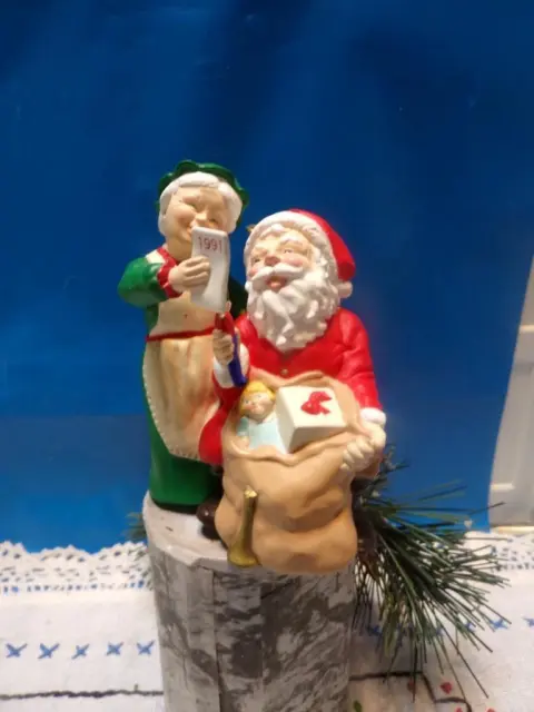 -Christmas-Hallmark Christmas Ornament CHECKING HIS LIST-sANTA Mr. And Mrs.Claus