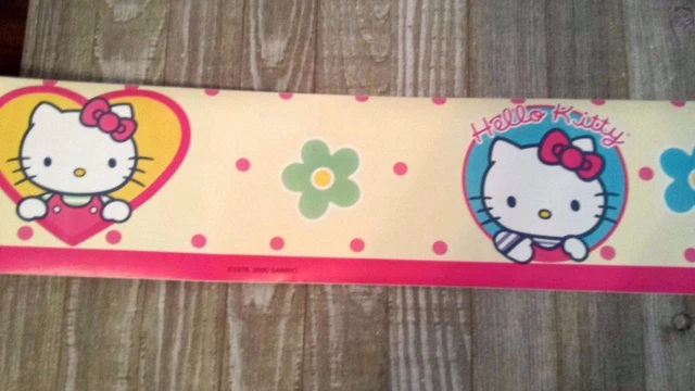 Rollo de borde de pared flores hello gatito personaje cáscara y palo nuevo en paquete