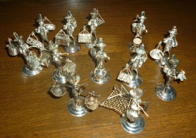 Set of 12 Chinese Silver Place Name Holders Modelled as Street Vendors
