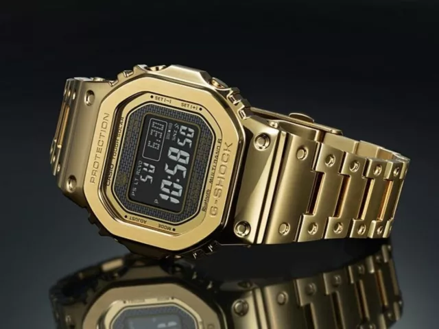 G shock full sale metal 5000 gold