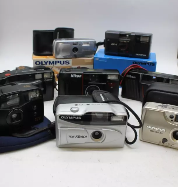 C x8 Vintage Point & Shoot Cameras Inc. Olympus I-10, Nikon L135 AF, Canon etc