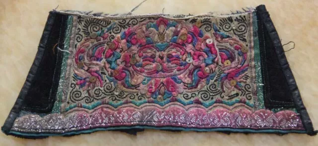 Tribal exotic chinese ethnic minority people's old hand embroidery