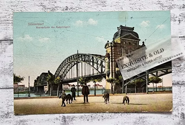 AK Düsseldorf Rheinbrücke Radschläger Akrobaten Ansichtskarte Postkarte Vintage