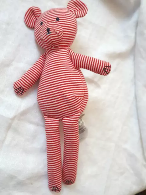 doudou PETIT BATEAU OURS RAYE ROUGE BLANC (billes dans le corps) 28 cm