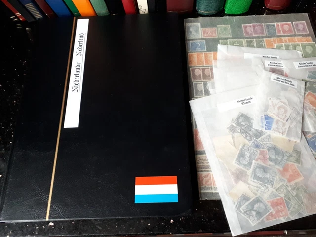 BRIEFMARKEN "NIEDERLANDE", auf 19 Albumseiten plus Tütenware