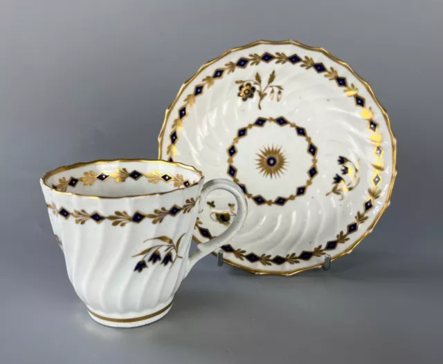 A late 18th century Flight period wrythen moulded coffee cup and sauc circa 1785