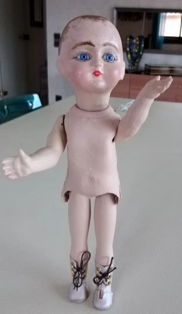 Sold Price: Poupée à tête en biscuit peint, yeux riboulant en sulfure