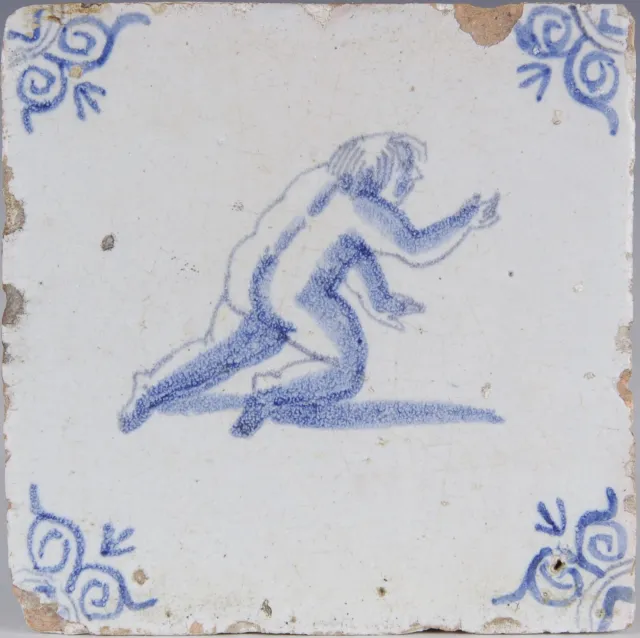 Nice Dutch Delft Blue tile, playing figure, mid 17th century.