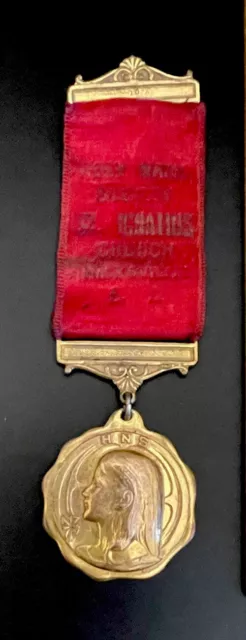 Vintage Catholic HNS Gold Tone Medal On Red Ribbon Pin