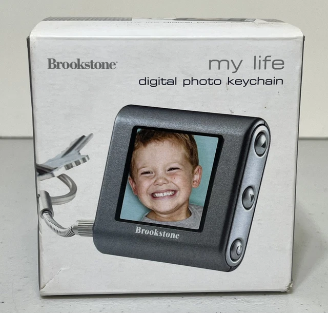 Brookstone My Life Digital Photo Keychain Holds 60+ Pictures Rechargeable Sliver