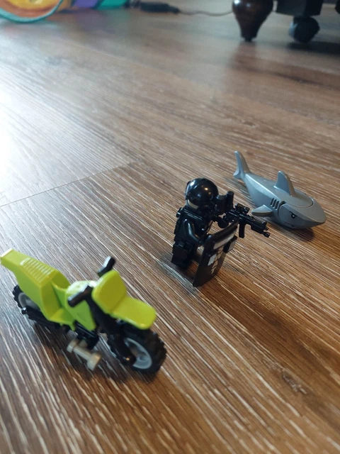 lego lot sets 7, Swat Team Member, Motorcycle, and Grey Shark