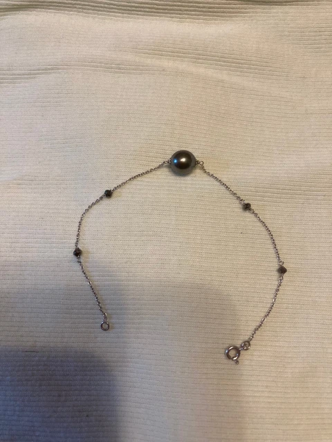 Superbe bracelet or blanc et perle noire