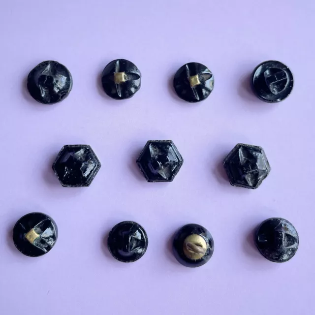 11 tiny assorted black glass buttons with carved details - self-shank and brass 3