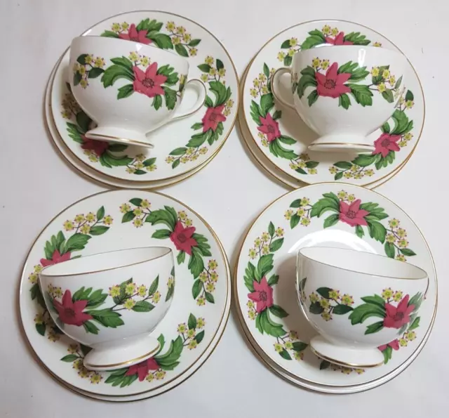 Wedgwood Bone China Tea Set,  "Starflower" design,  4 Cups, Saucers, Plates