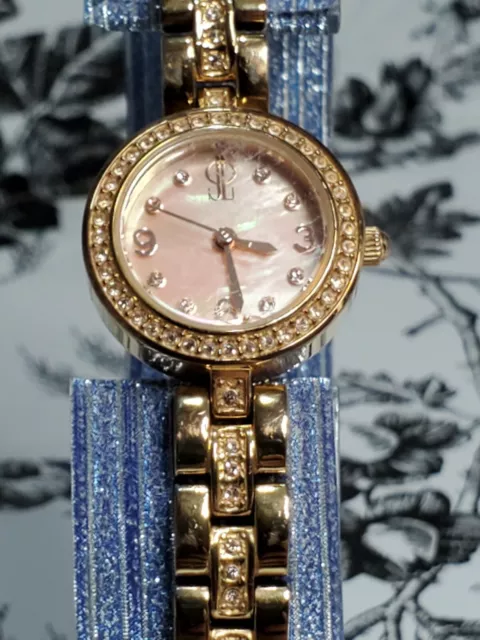 Jennifer Lopez Watch Women's Gold tone Pink MOP Rhinestone Bezel & Bracelet NICE