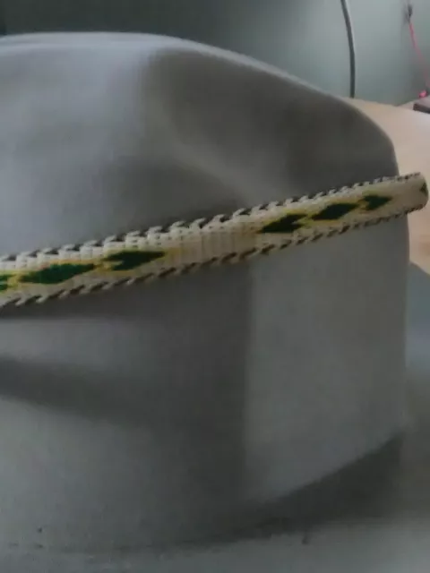 Hitched Horse Hair Hat band 1/2"wide. Double tassel, white,green, yellow,brown.