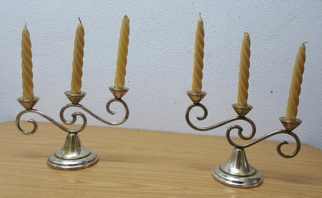 Pareja de candelabros de alpaca