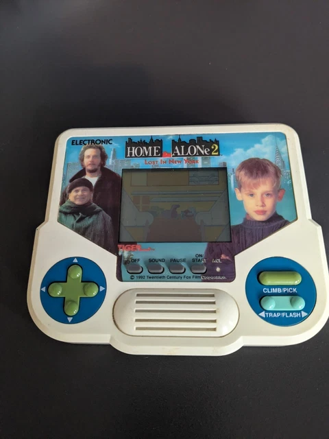 HOME ALONE 2 Tiger Electronic Handheld. 30.00 PicClick UK
