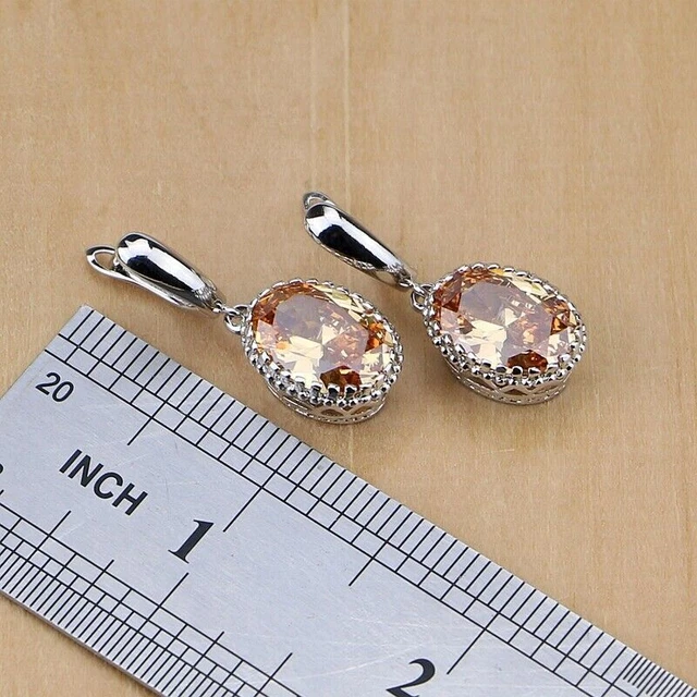 Orecchini In Argento 925 Con Zirconi Colore Champagne.