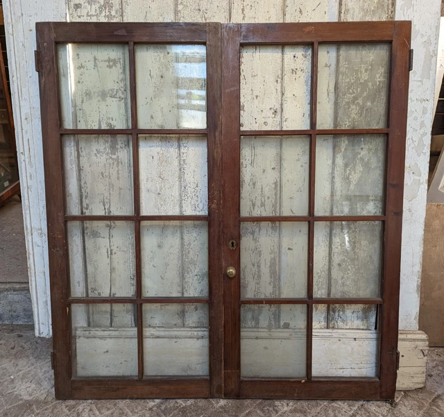 A PAIR OF RECLAIMED GLAZED PINE CUPBOARD DOORS Ref CS0107