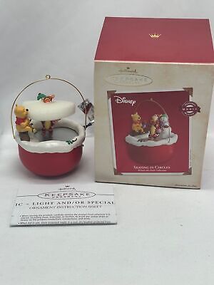 2002 hallmark skating in circles Winnie the Pooh ornament not tested as is