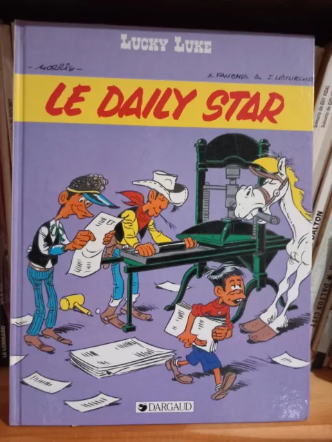 Bd. Lucky Luke.  Eo. Le Daily Star