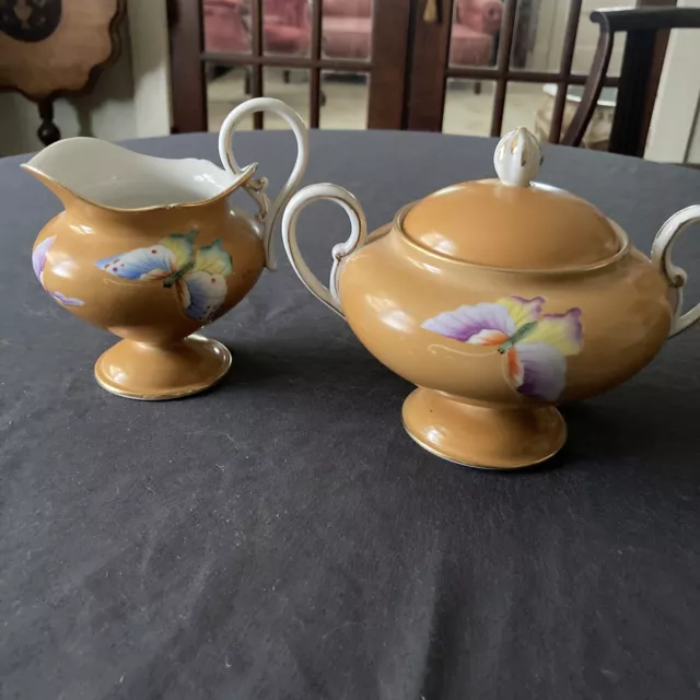 Antique Handpainted Nippon Sugar and Creamer with Butterfly’s