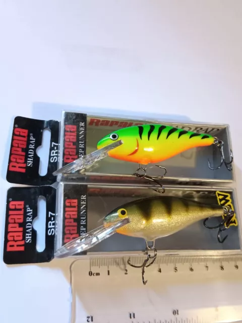 https://www.picclickimg.com/An4AAOSwcRZlSF1v/Rapala-fishing-lures-pair-of-SR-7-Shad-Rap.webp