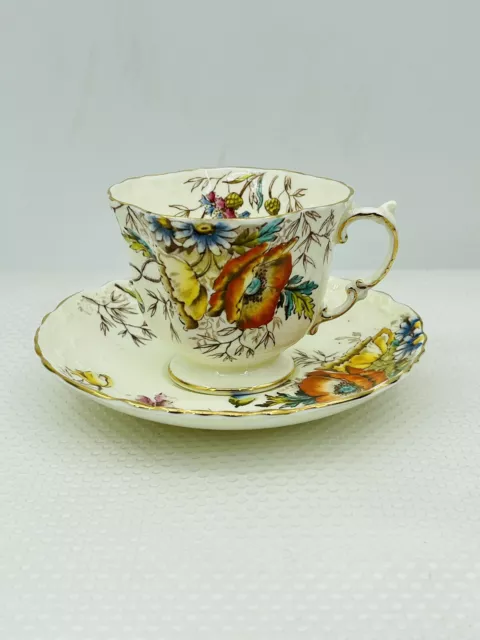 Juego de taza de té y platillo de patas Aynsley amapolas Inglaterra