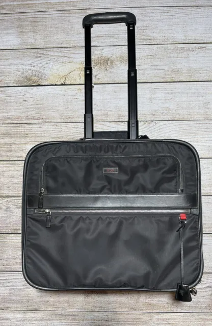 TUMI  Berlin Wheeled Black Nylon Expandable Wheeled Briefcase Carry On Messenger