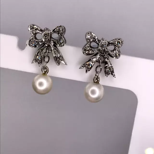 9 Carat White Gold Diamond & Suspended Cultured Pearl Bow Earrings. Post Backs