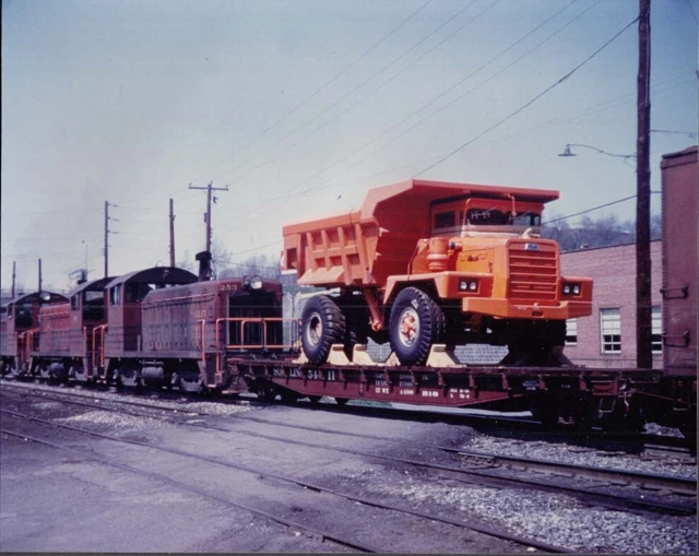 1969 Mack Off-Highway Dump truck photo on Soo Line flat car color photo